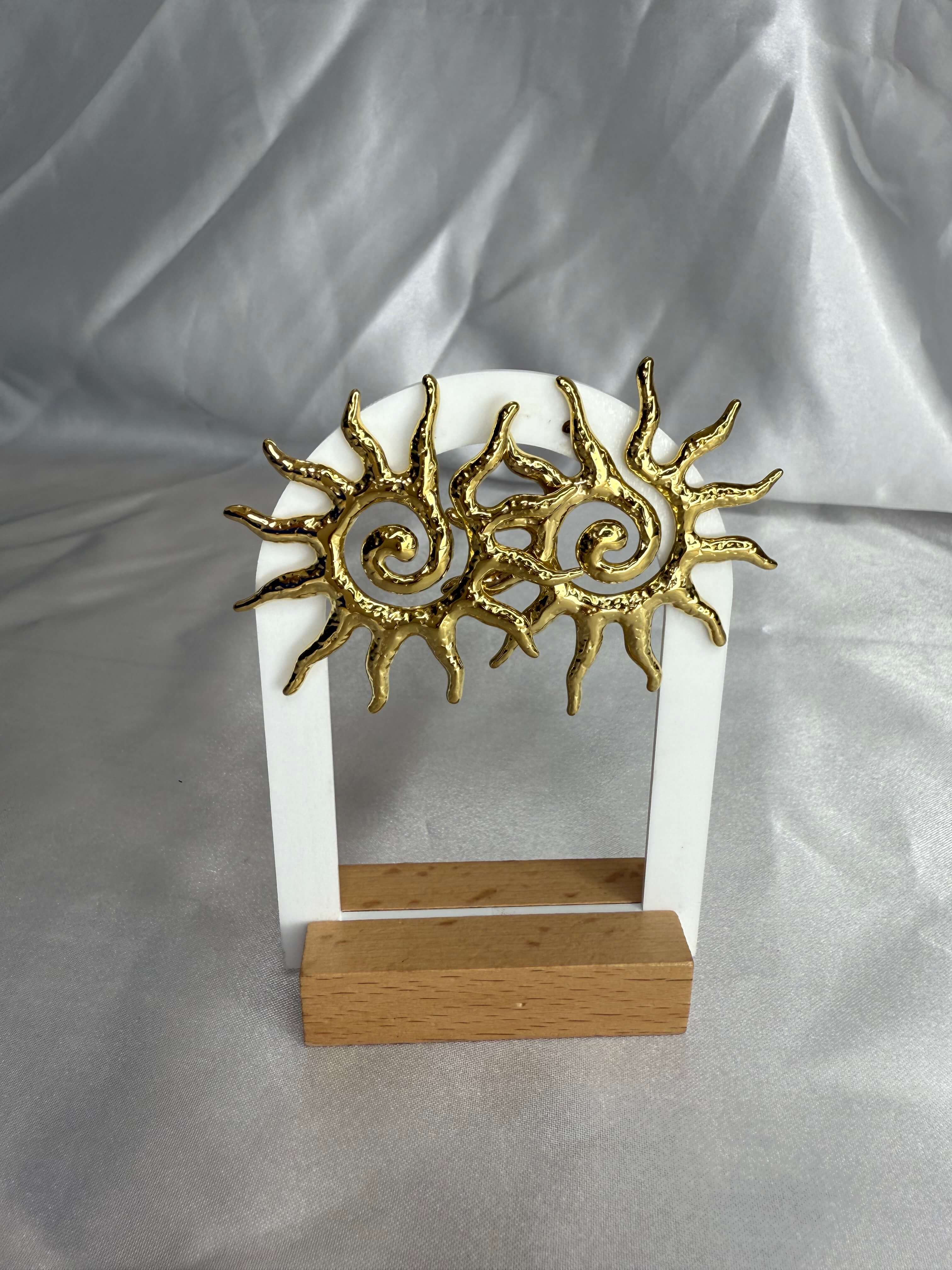 Boucle d’oreille soleil